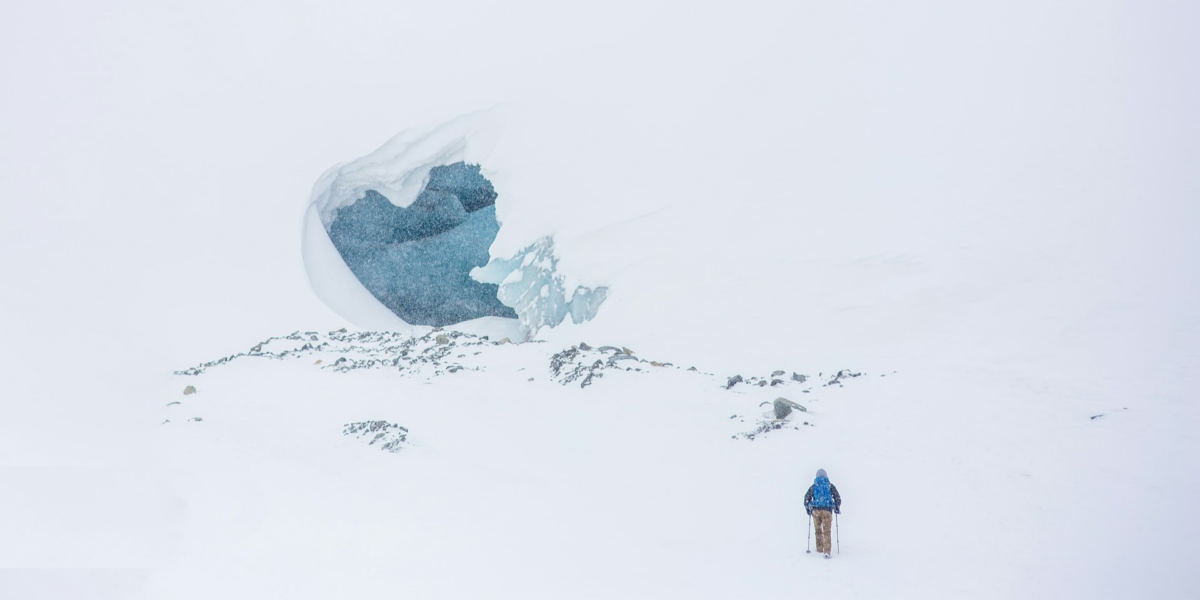 The Allure of Hiking Across Snowy Mountains